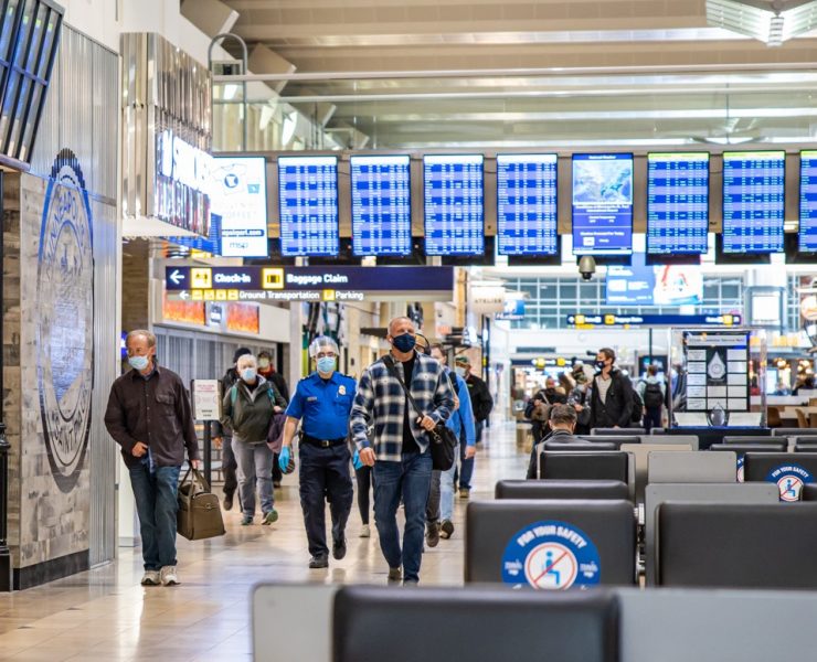 people walking in a terminal