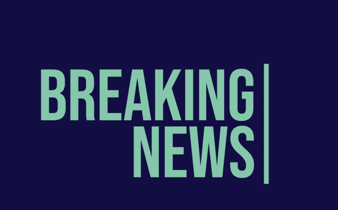 a blue and green text on a dark background