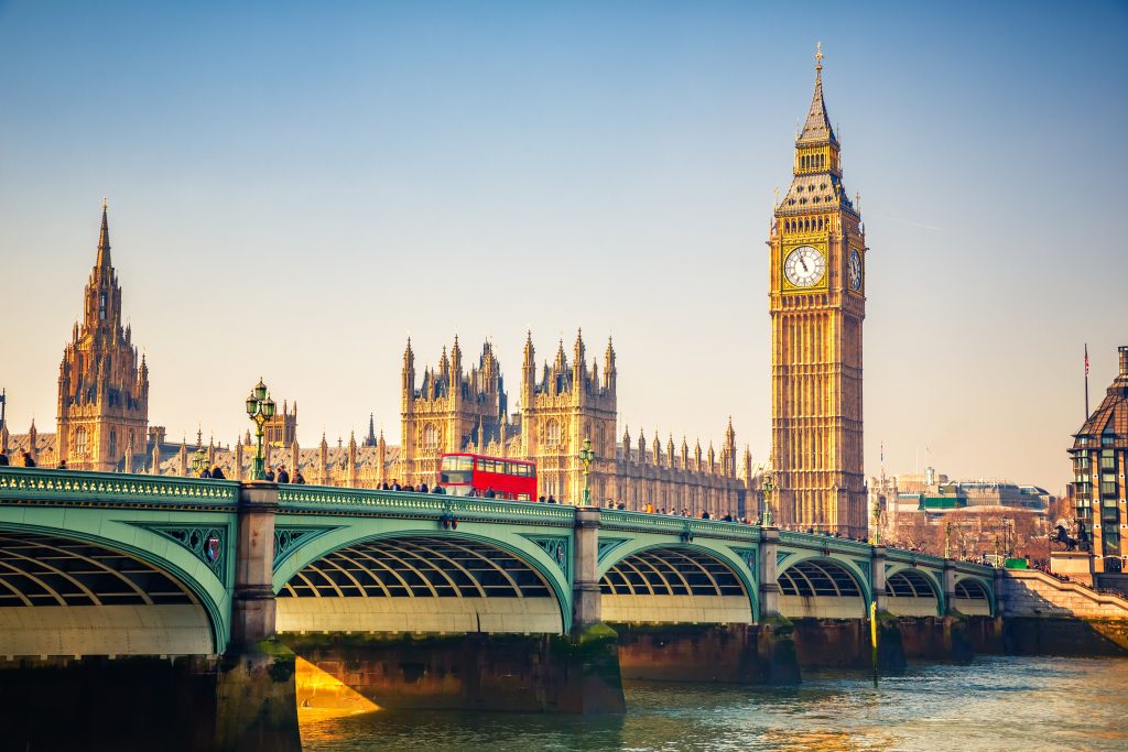 Big Ben with a clock tower and a large building