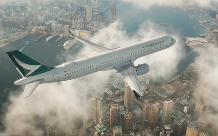 an airplane flying over a city