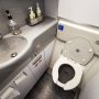 a toilet and sink in a bathroom