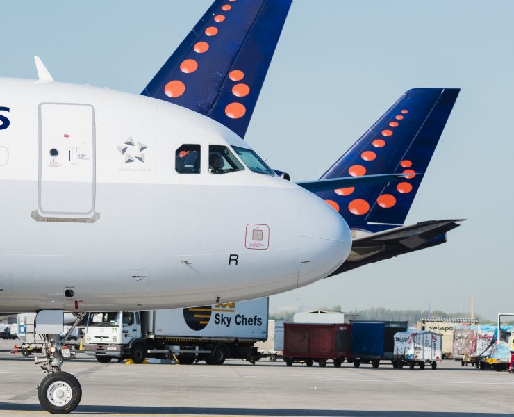brussels airlines Airbus A320 parked in front of two other Brussels Airlines planes