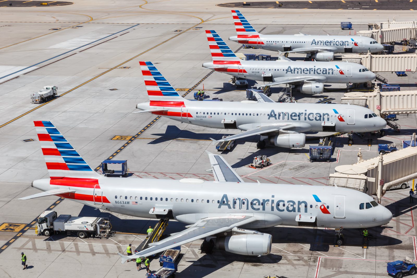 airplanes parked on a runway