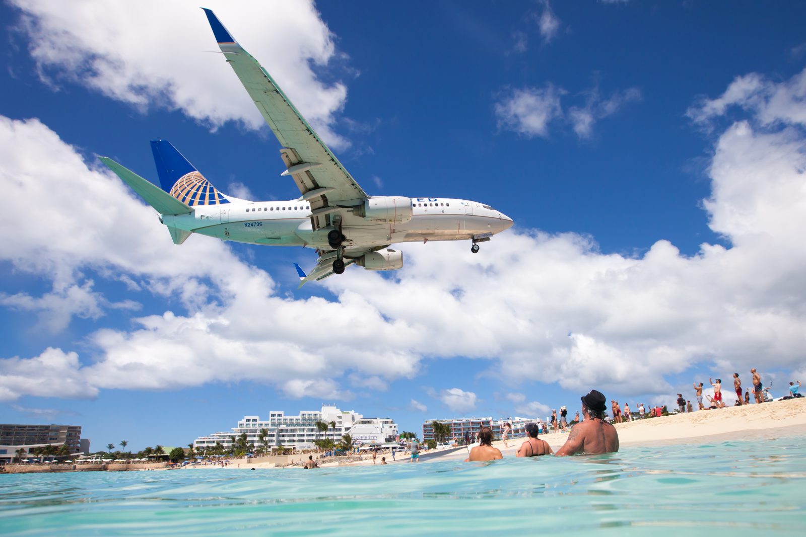 a plane flying over water