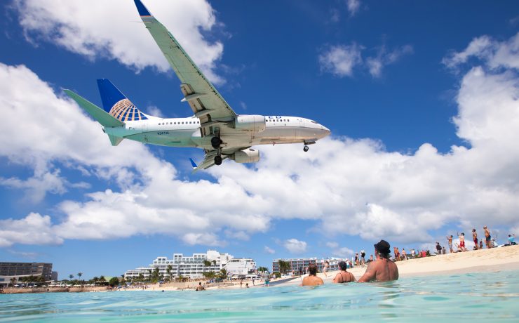 a plane flying over water