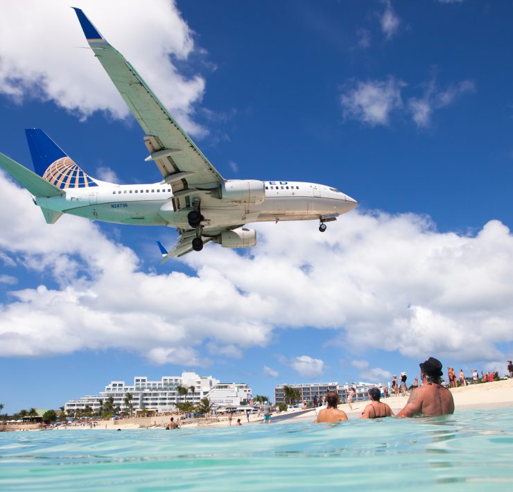 a plane flying over water