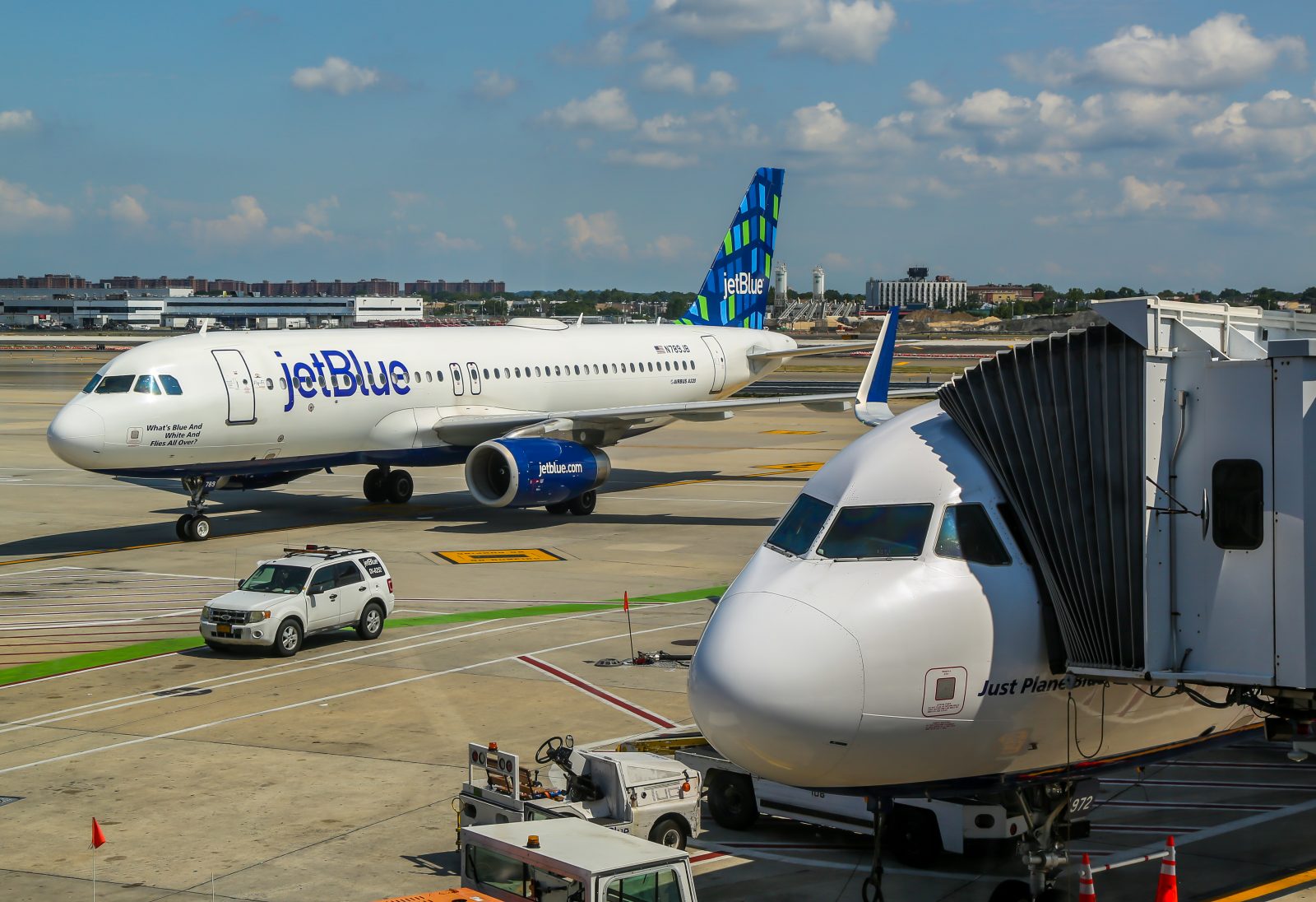 a jetblue airplane on a runway