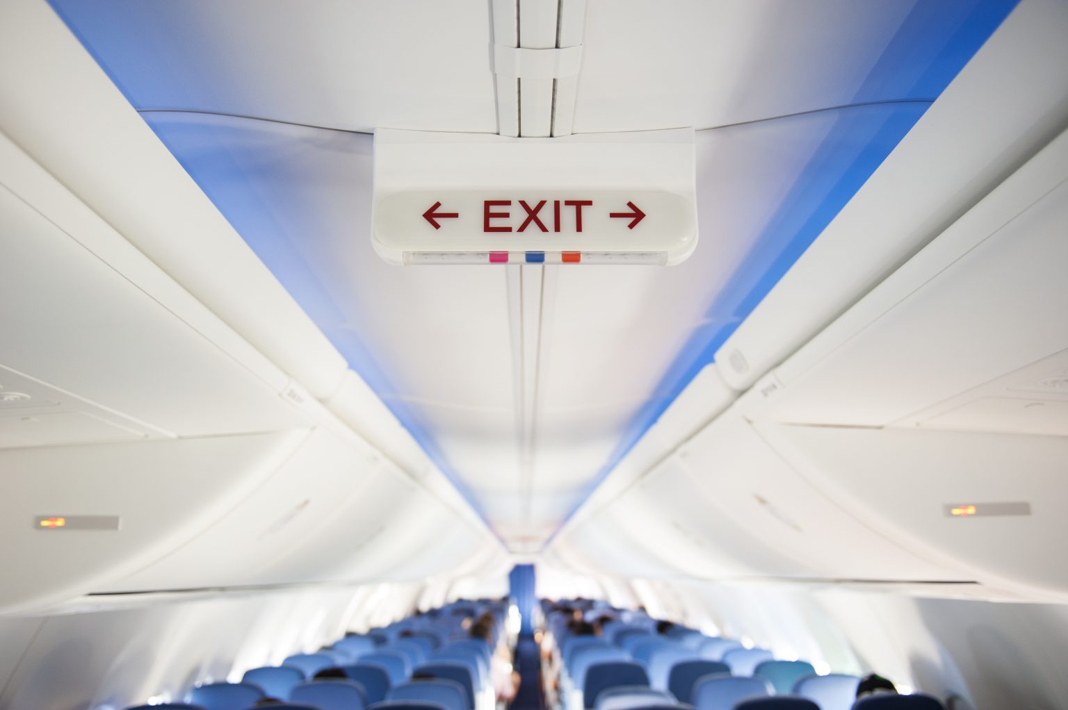 What Do The Different Lights On An Airplane Exit Sign Actually Mean to