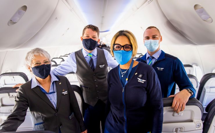 a group of people wearing face masks