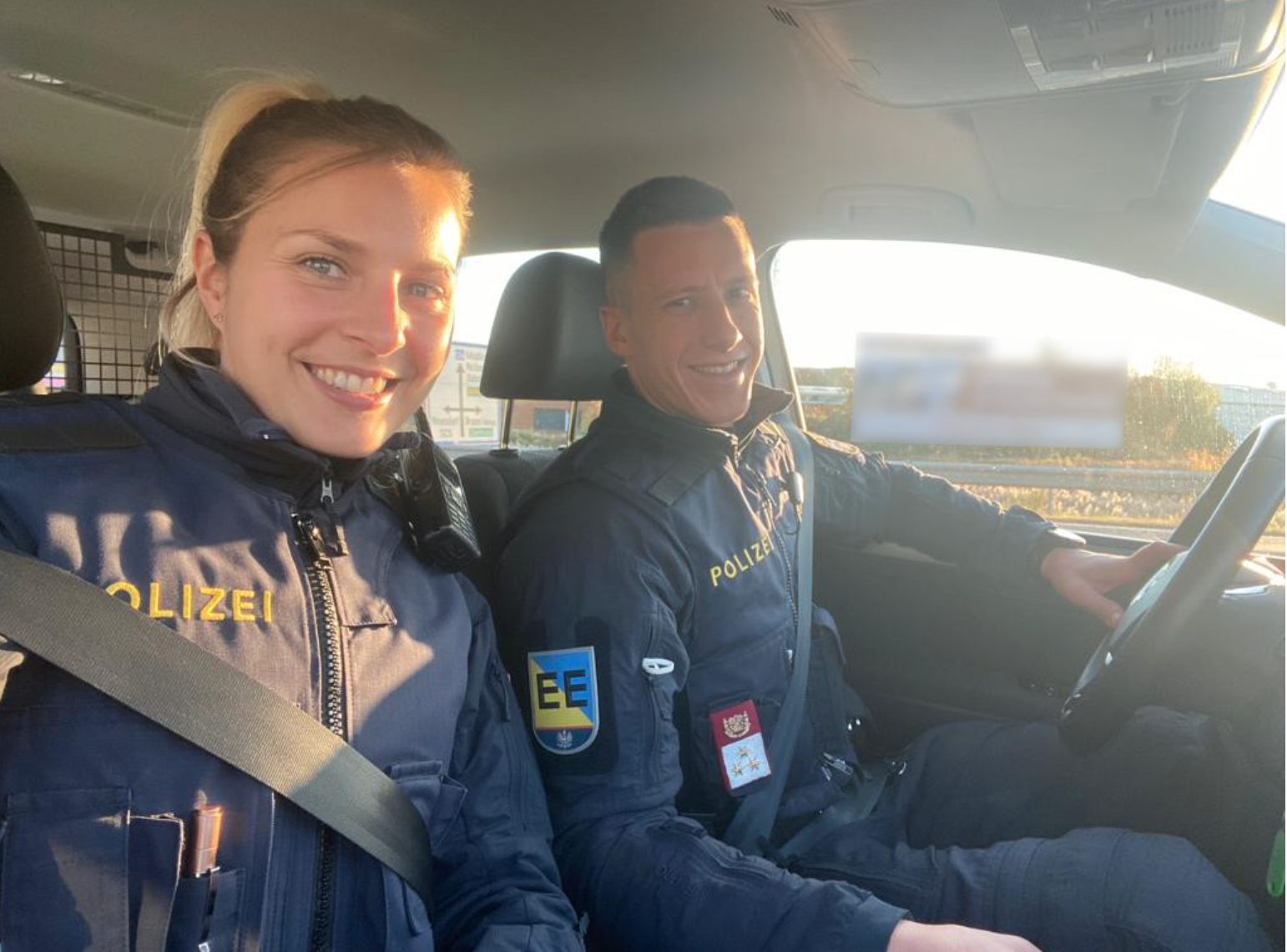 a man and woman in a car