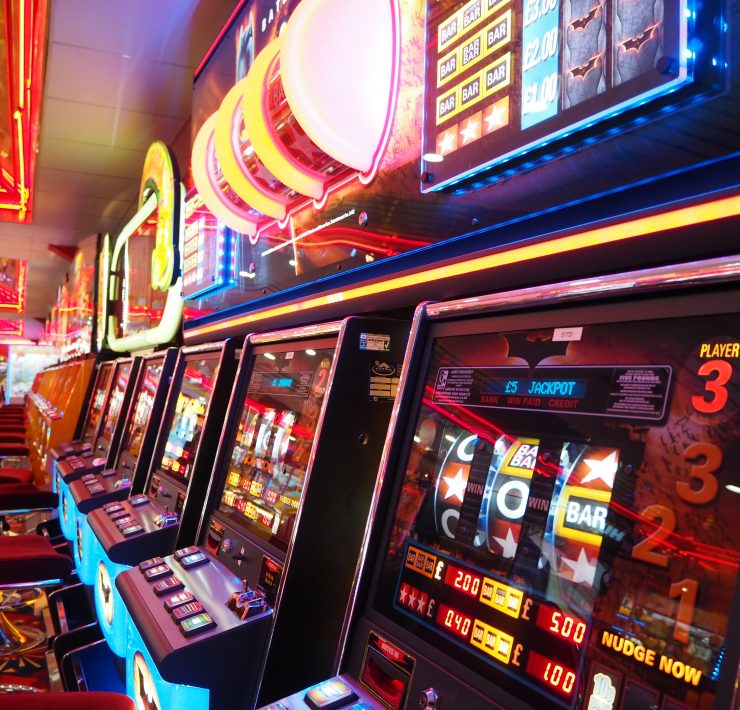 a row of slot machines in a casino