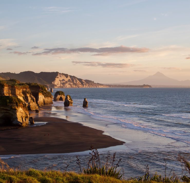 a beach with rocks and water