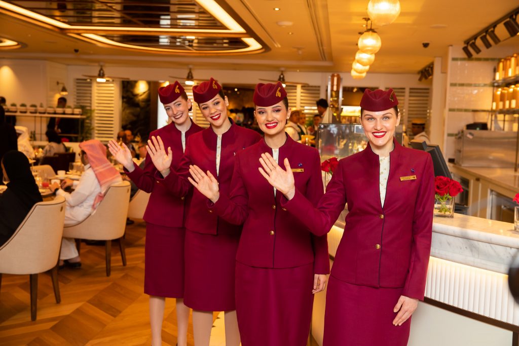 a group of women wearing red uniforms