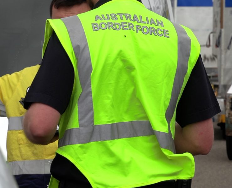 a man in a yellow vest