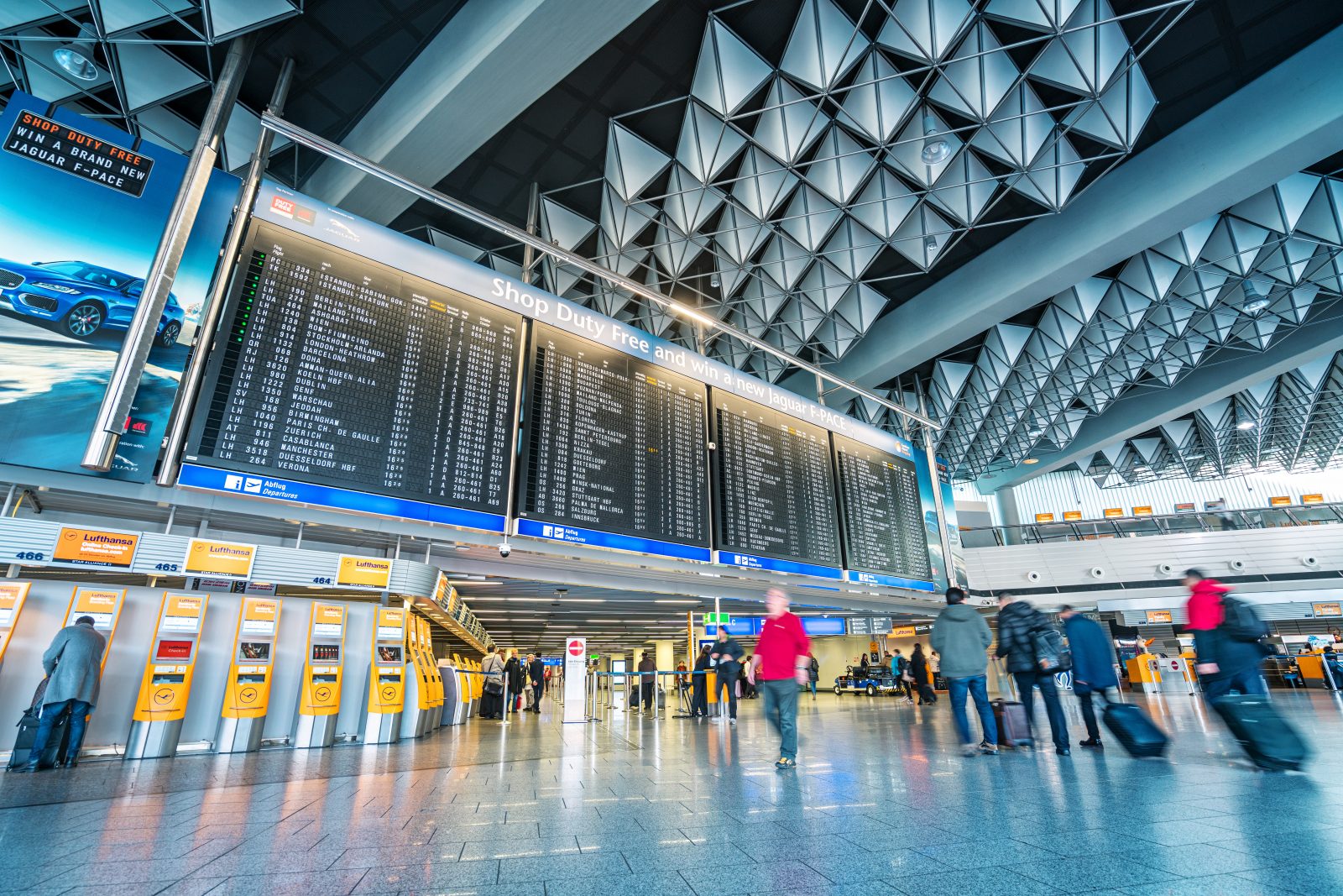 a group of people in a terminal