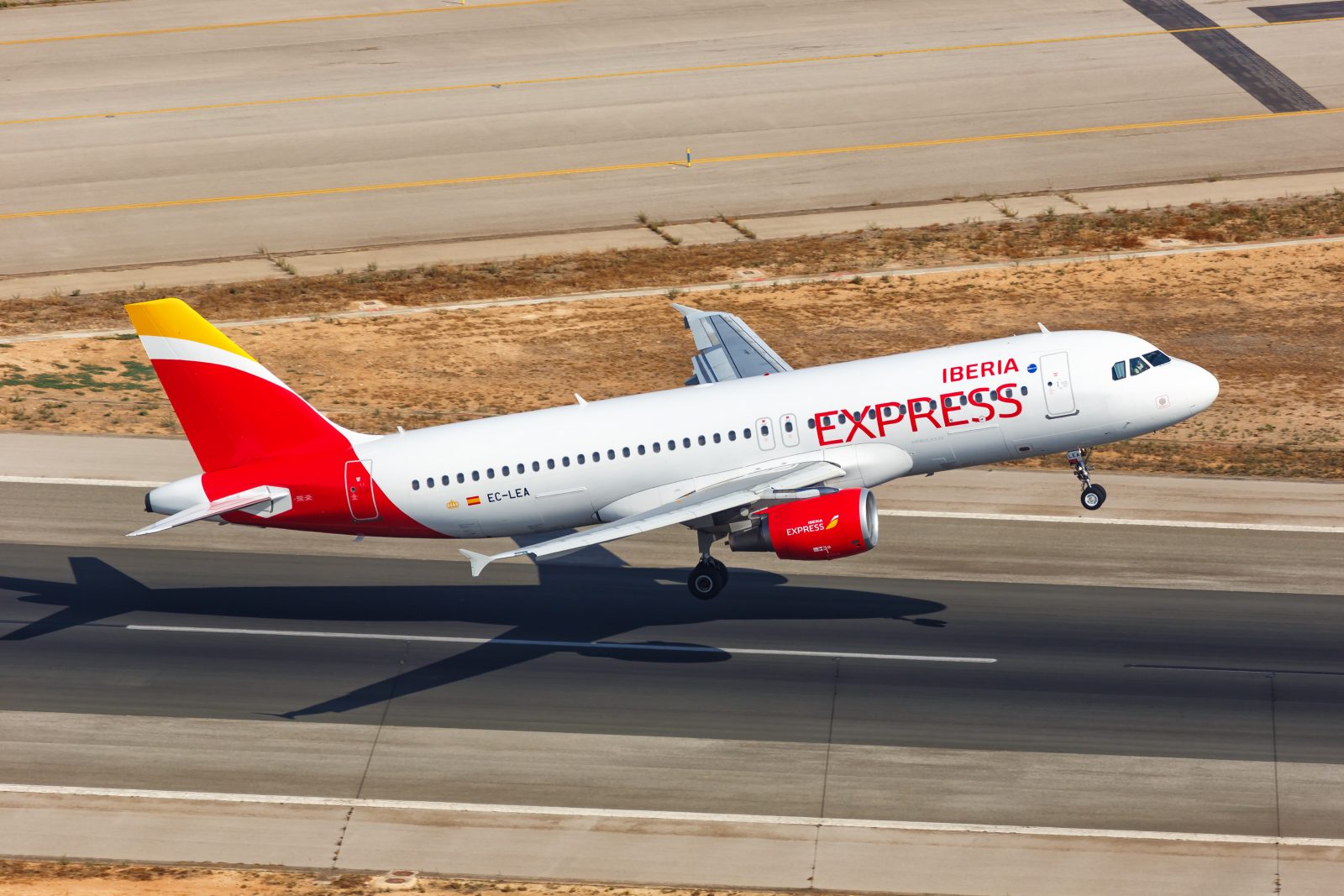 a plane taking off from a runway