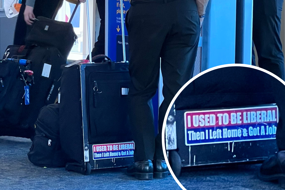 a person standing next to luggage