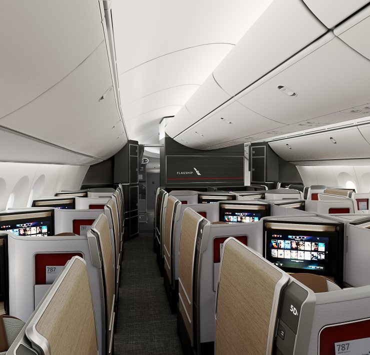 an airplane with seats and monitors