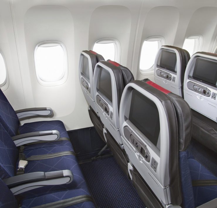 seats in an airplane with windows