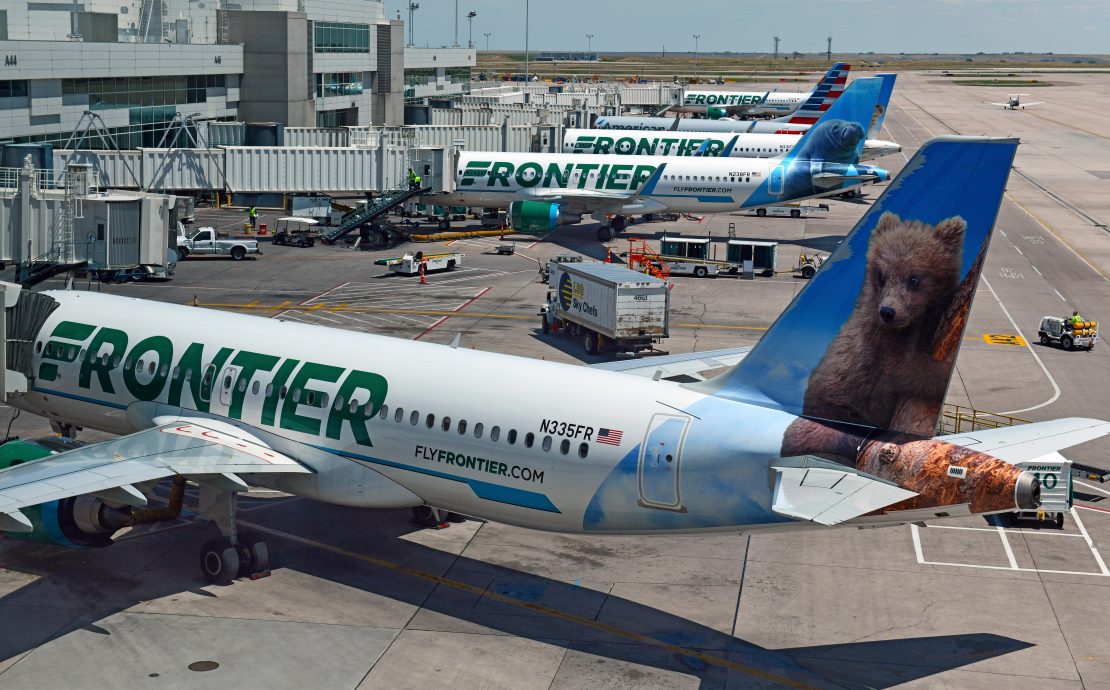 airplanes parked at an airport