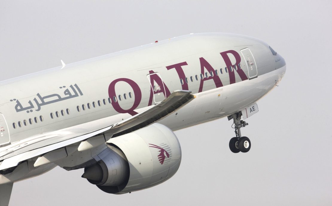 a plane flying in the sky