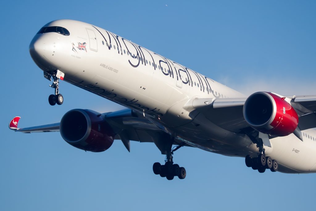 a large white airplane in the sky