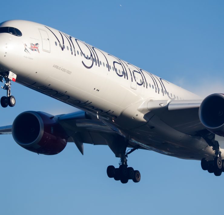 a large white airplane in the sky