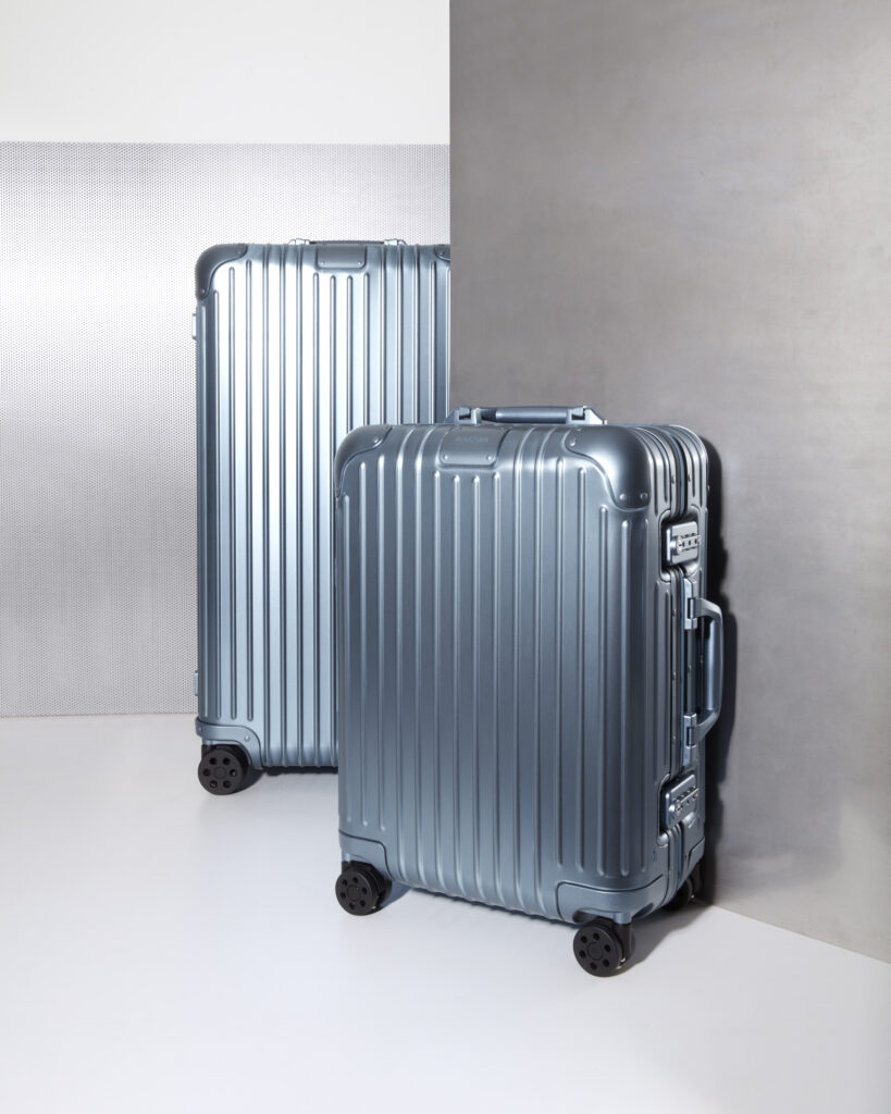a couple of luggage in a room