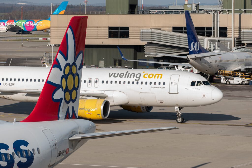 airplanes parked at an airport