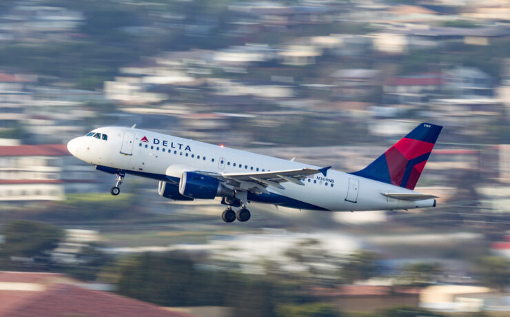 a plane flying in the sky