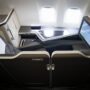 a seat with a monitor on the back of the seat