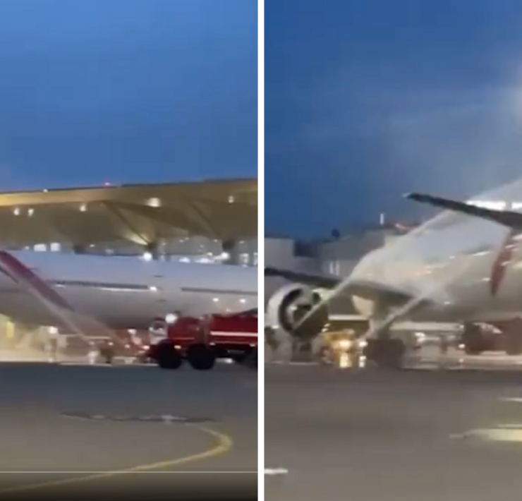 a plane spraying water on the ground