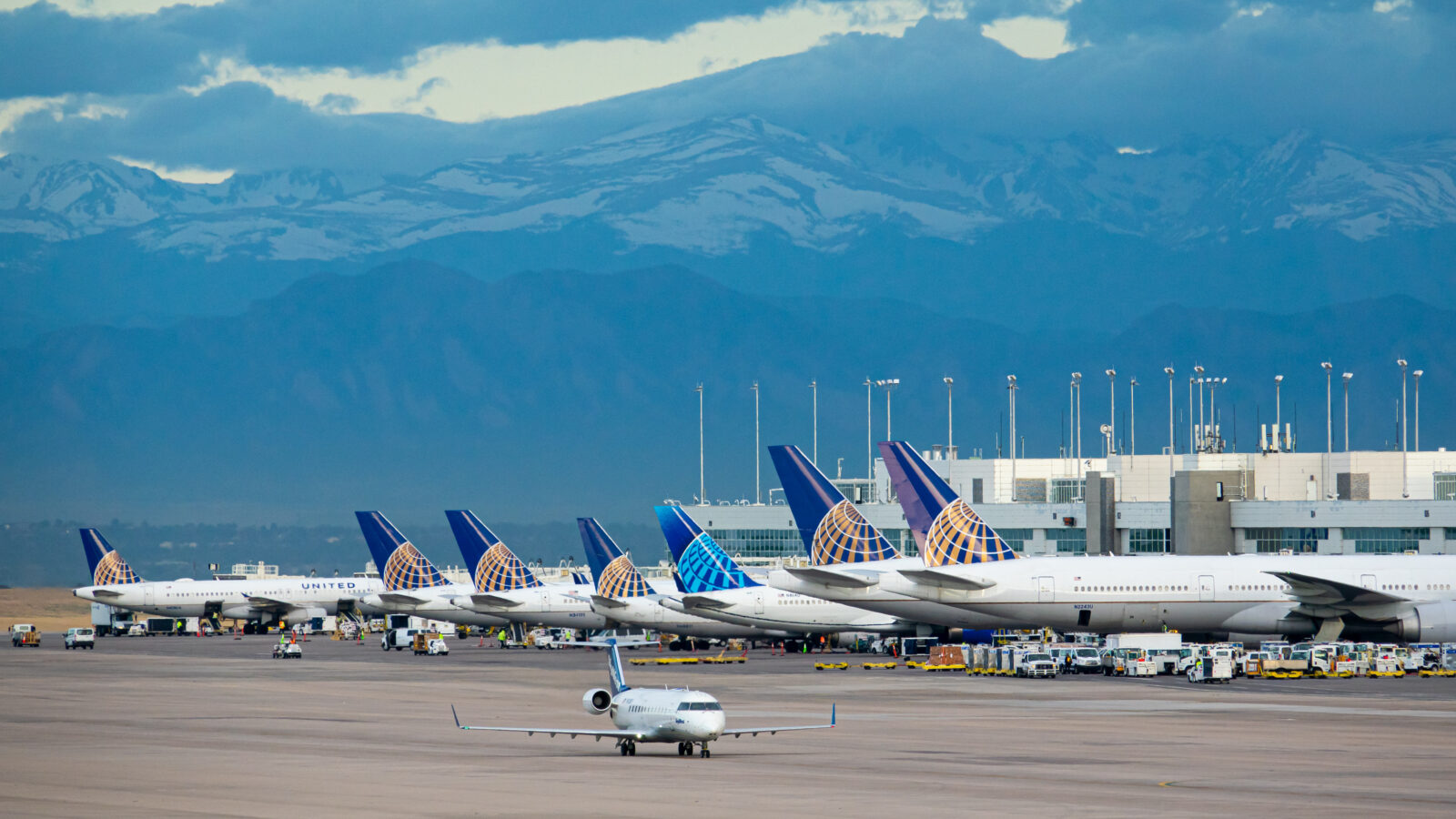 airplanes parked at an airport