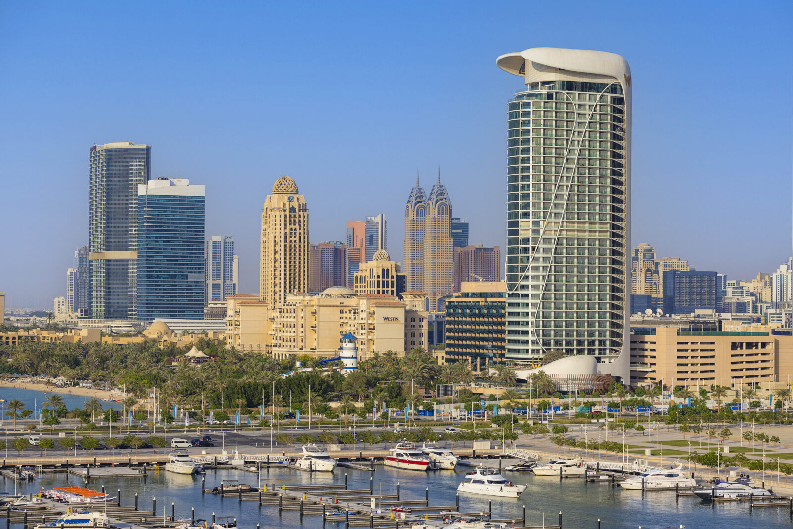 a city with boats and buildings