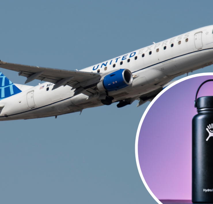 a white airplane with blue and white text