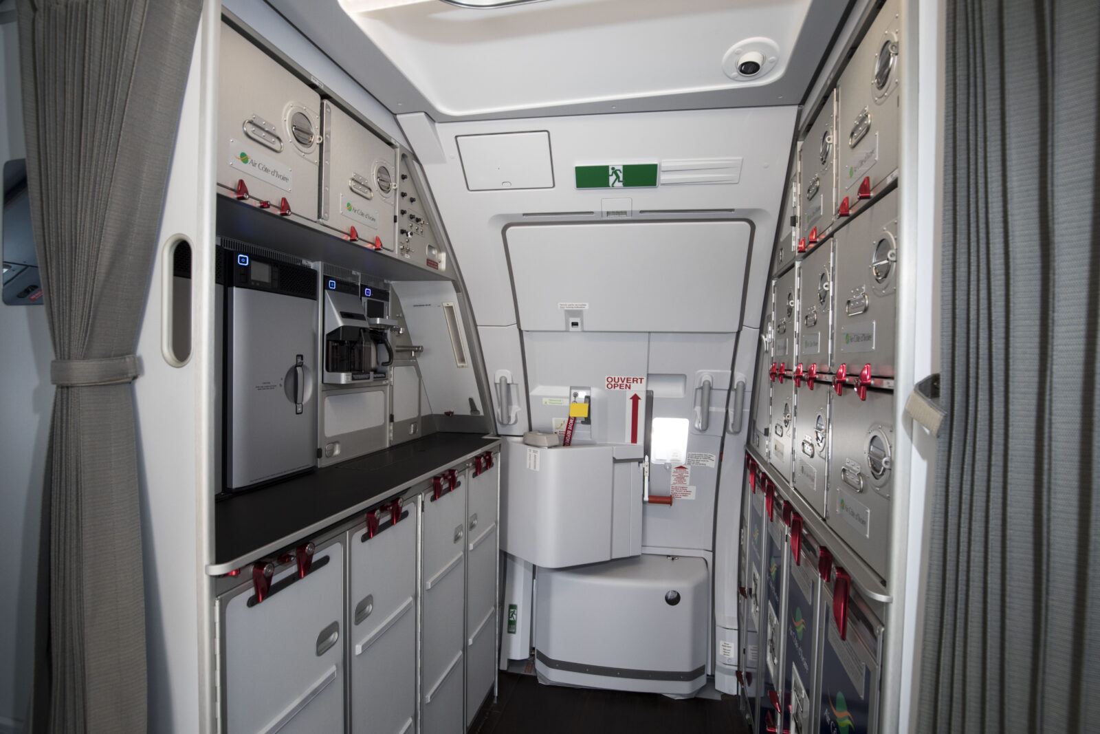 a white and grey interior of an airplane