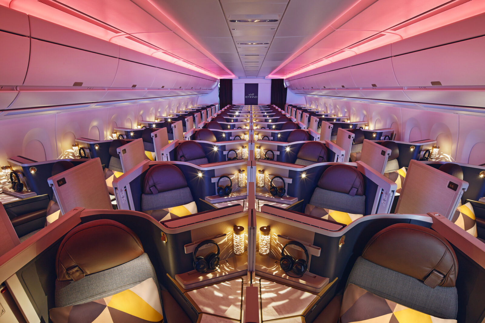 inside a plane with rows of seats