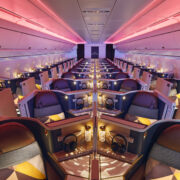 inside a plane with rows of seats