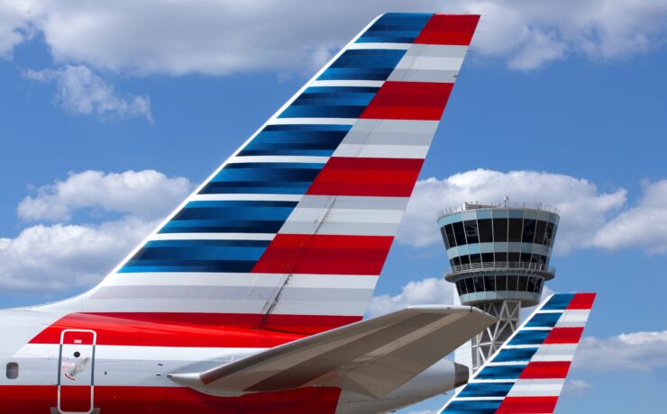 the tail of an airplane with stripes on it