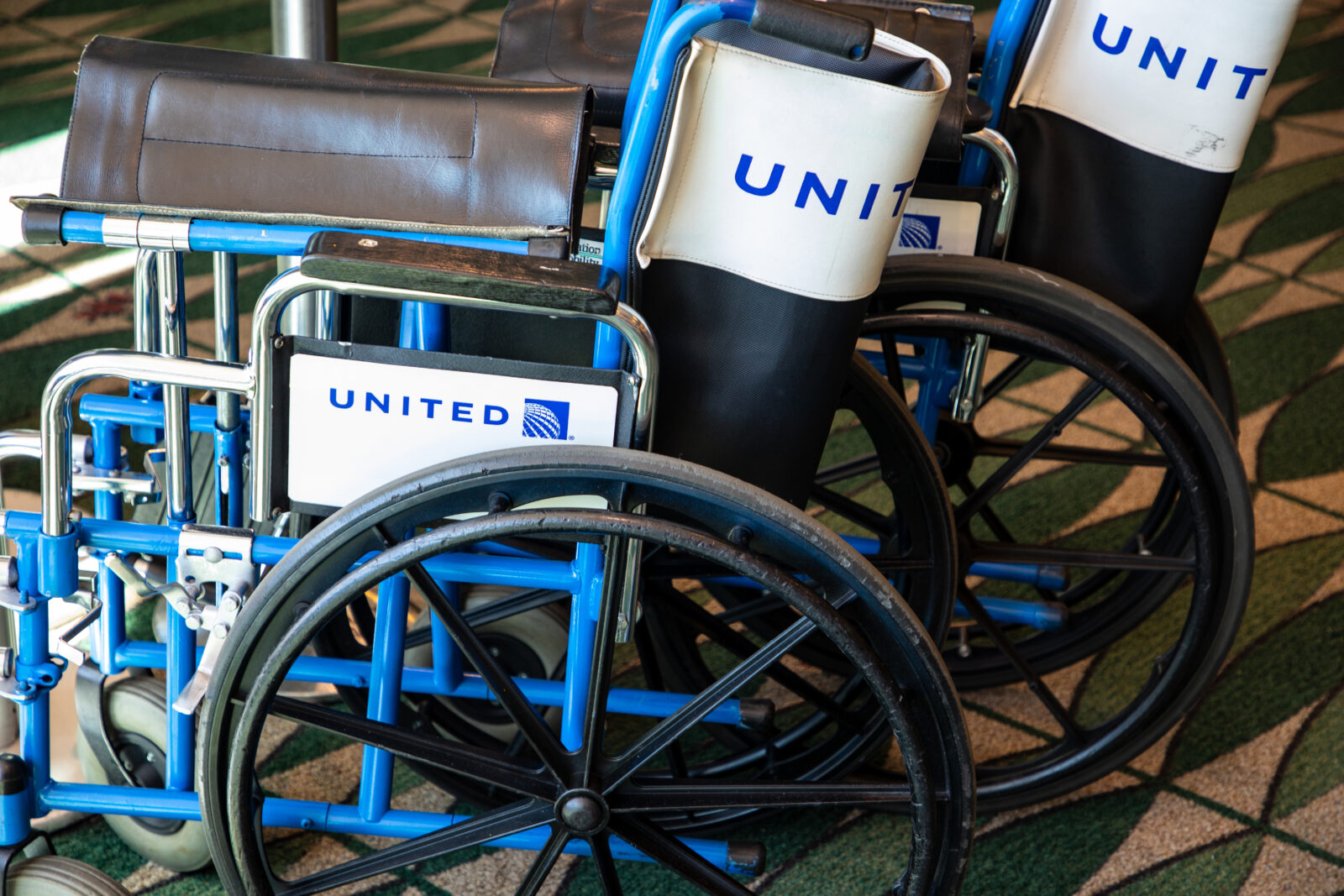 a group of wheelchairs on a carpet