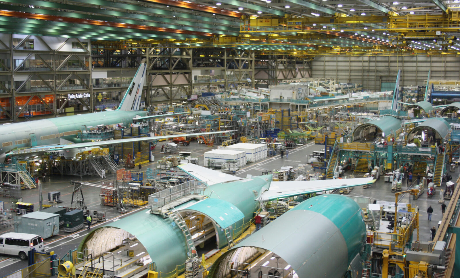 an airplane factory with many airplanes in it