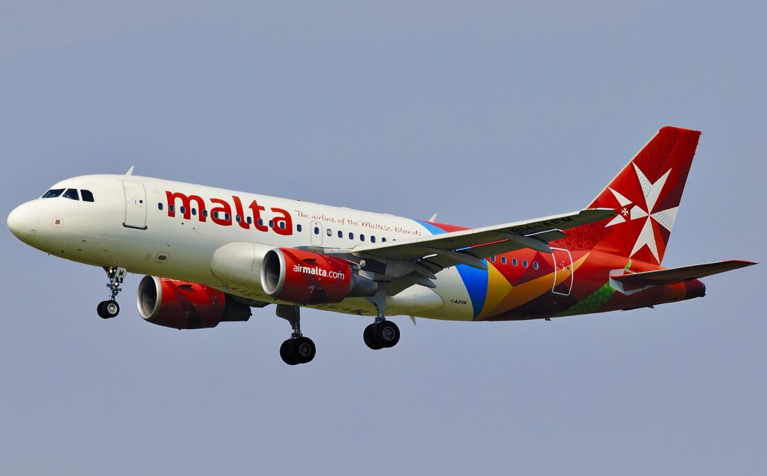 a plane flying in the sky