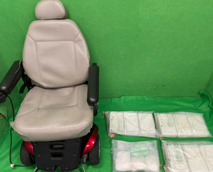 a chair next to bags of white substance