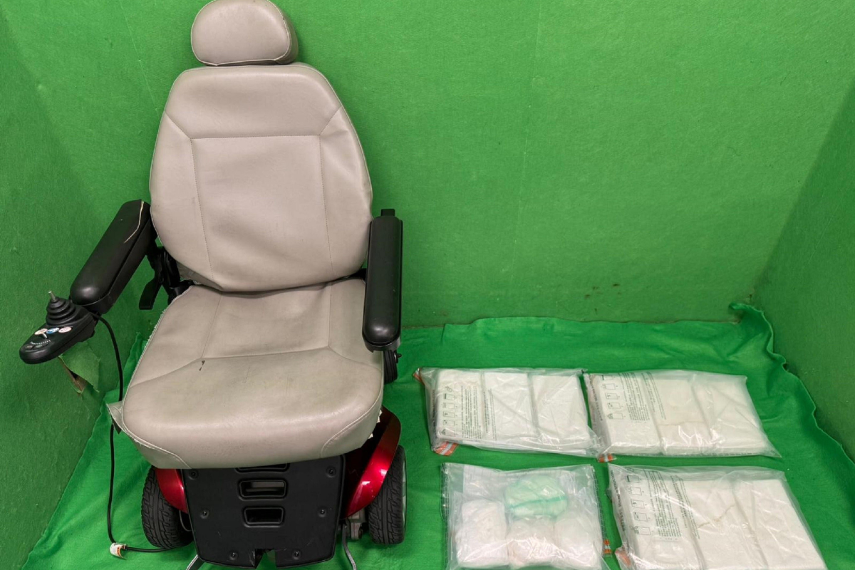 a chair next to bags of white substance