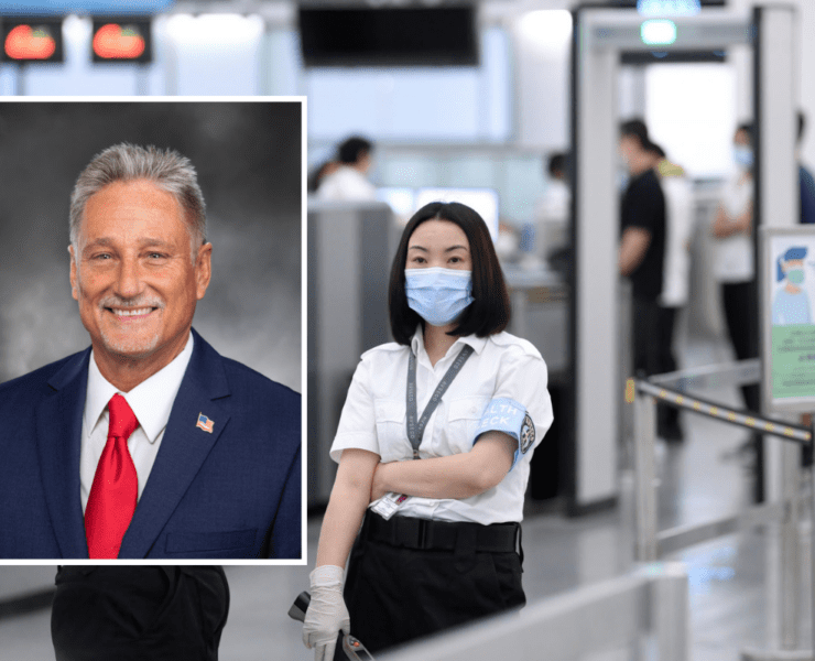 a woman wearing a mask and a man wearing a suit