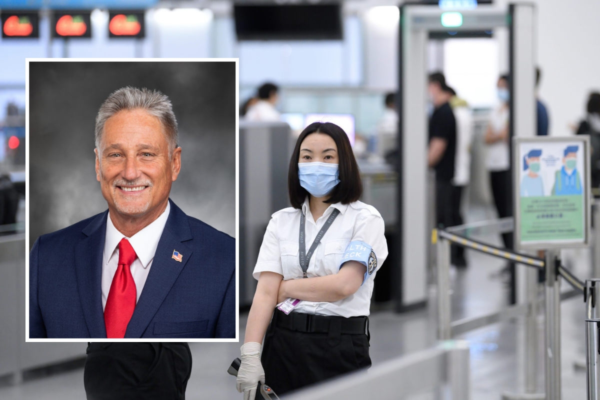 a woman wearing a mask and a man wearing a suit