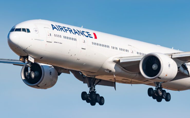 a white airplane in the air