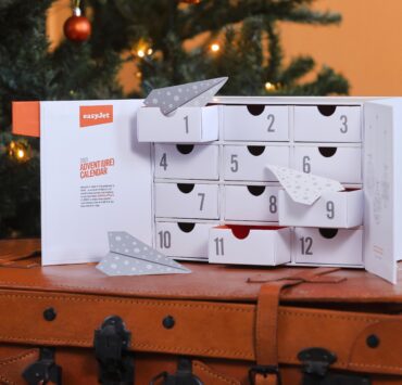 a advent calendar with paper planes in the front