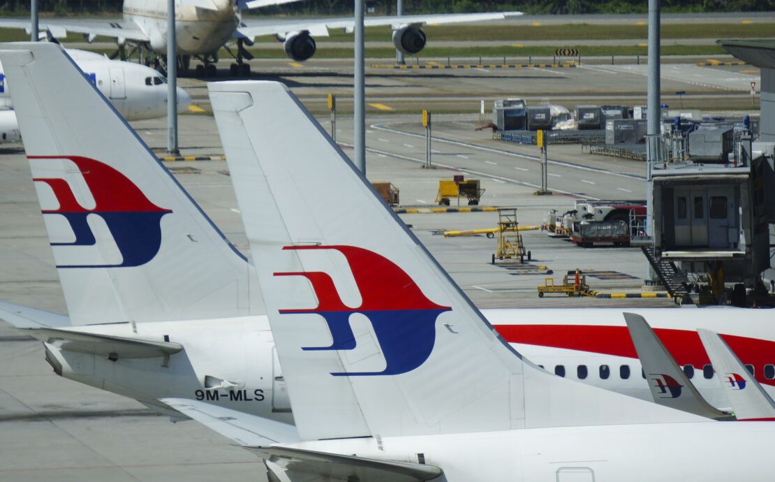 airplanes parked at an airport