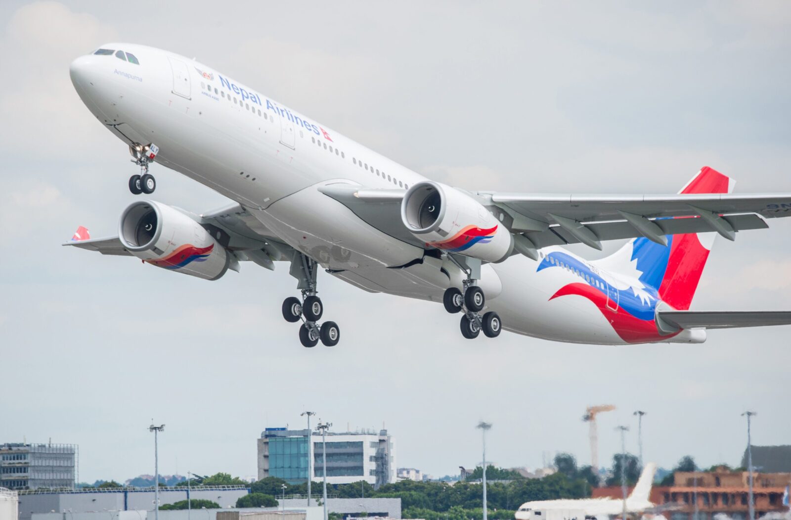 a large airplane flying in the sky